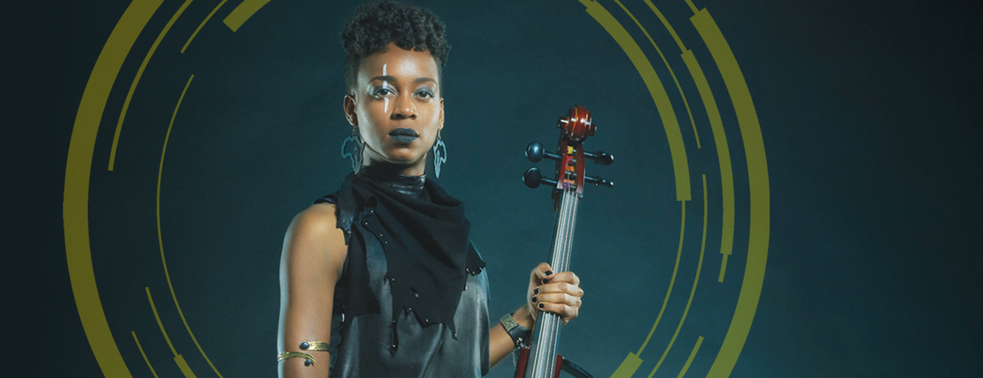 Ayanna Witter-Johnson facing, holding a cello