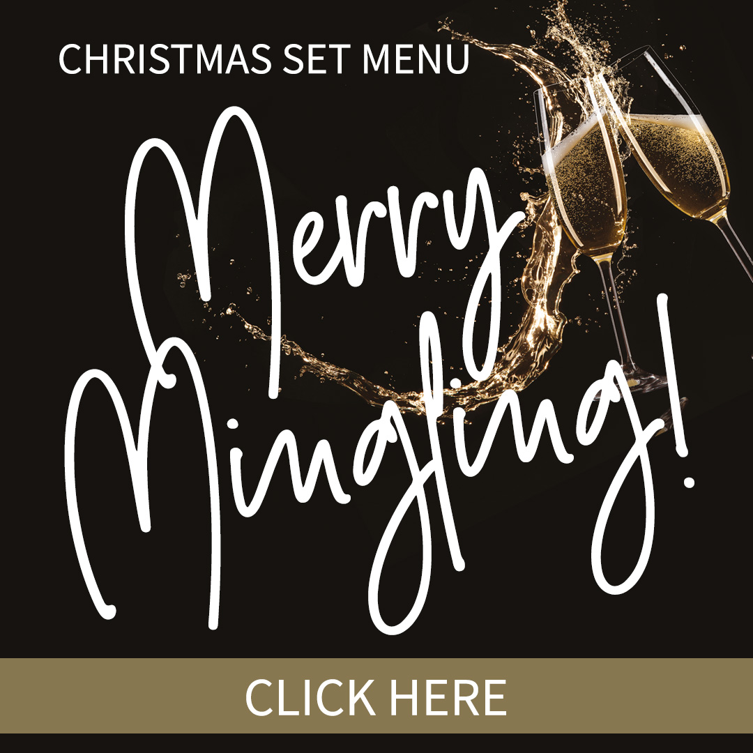 Two champagne glasses clinking with the caption Christmas Set Menu