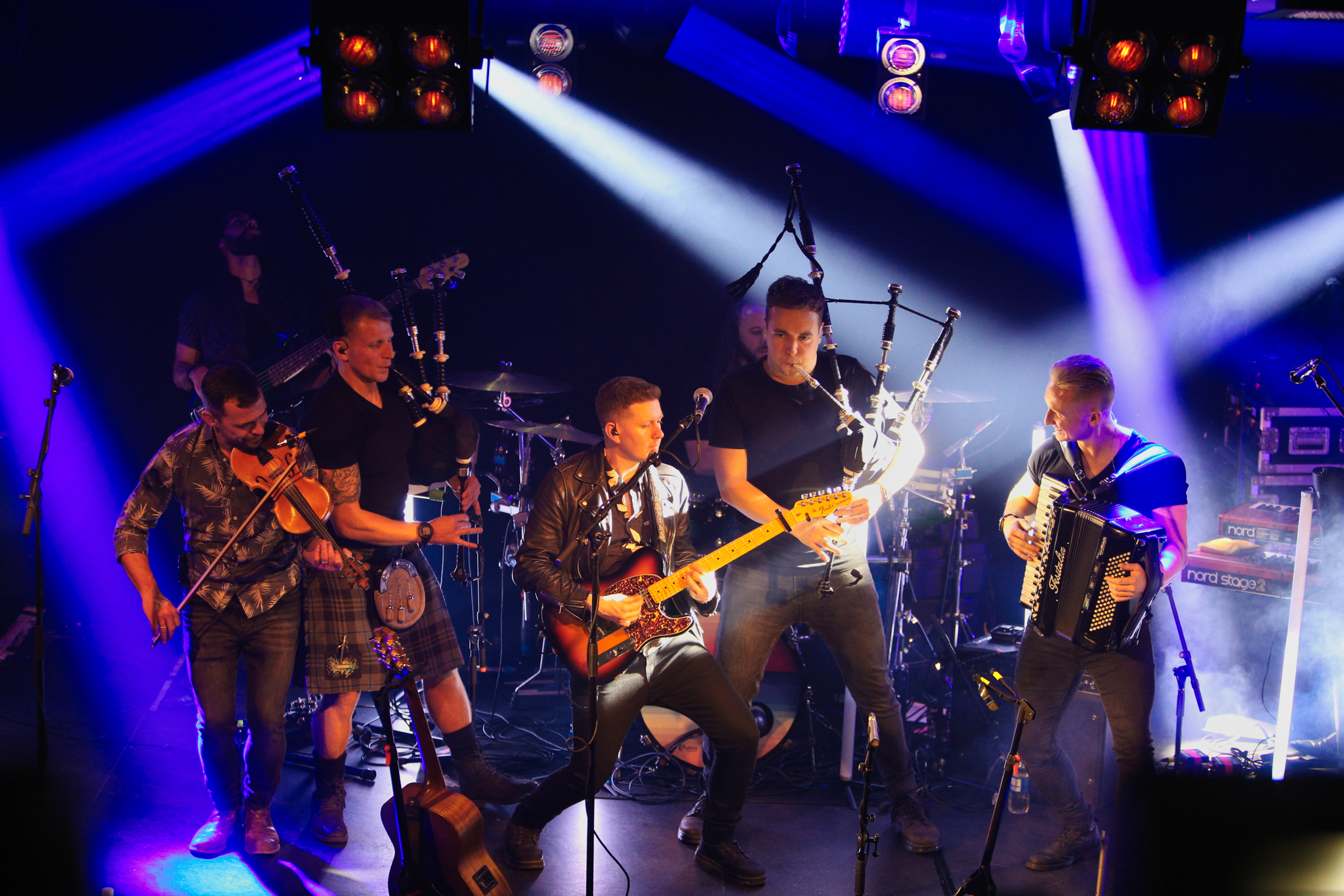 Skerryvore band playing instruments on stage